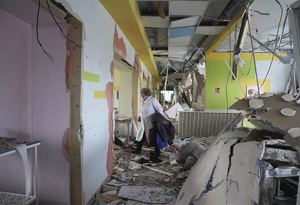 Medical worker walks through hall of maternity hospital in Mariupol Ukraine