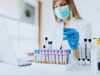 female lab worker testing samples