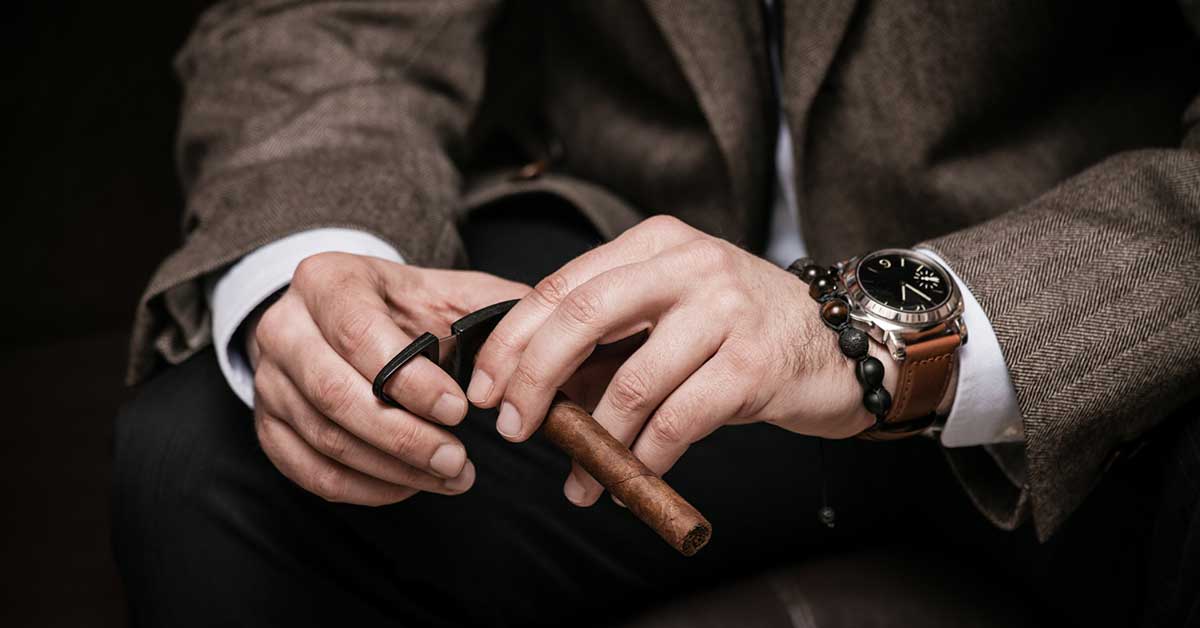 man holding a cigar