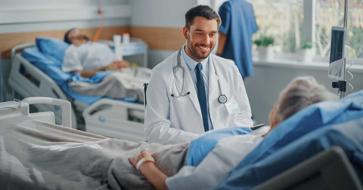 Doctor talking to patient in revovery