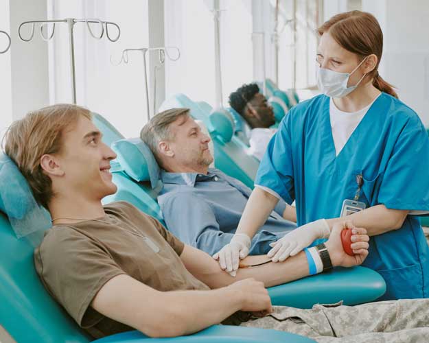 People donating blood