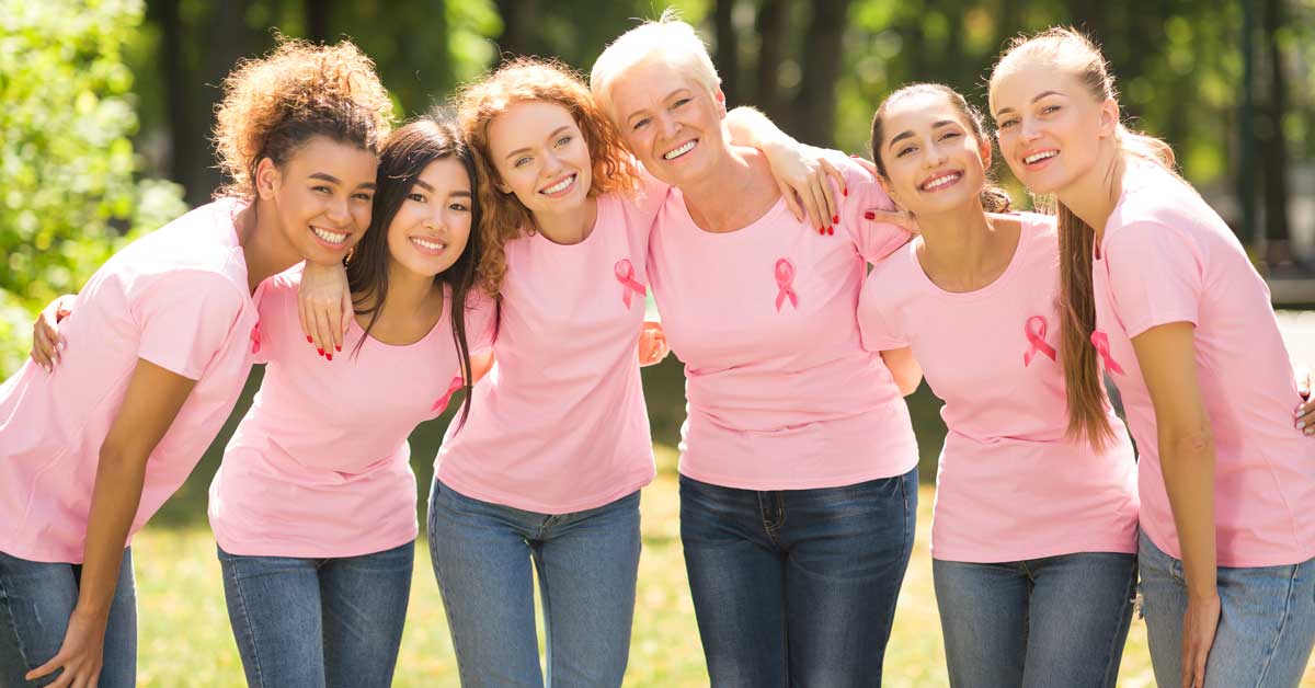 Group of women with breast cancer awareness shirts